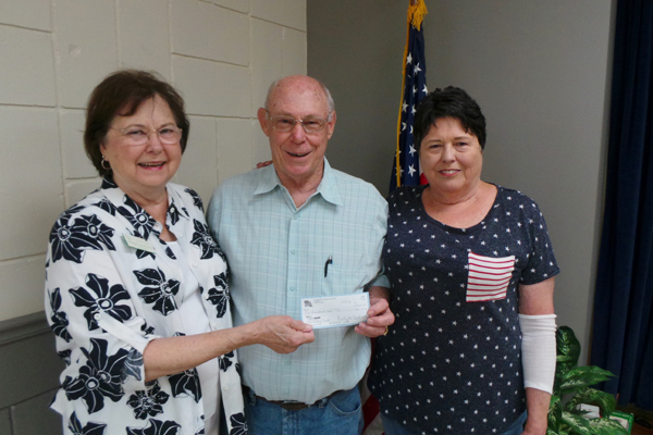 Photos submitted by Patricia Serio:  :  (l-r) Scholarship Chair Barbara Nicholson, Jay Muffly, LCA Board Member & Cathy Mathes, Woman’s Club President 