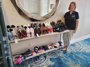 Club Donation of Socks and Shoes for Kicks for Kids Campaign