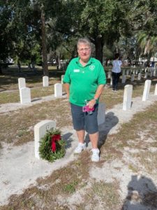 Member Laying Wreath of Veterans's Grave