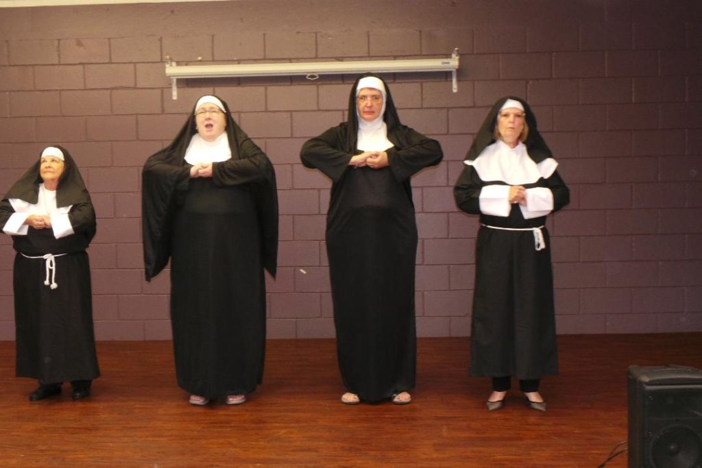 Club Members Performing as the Sister Act