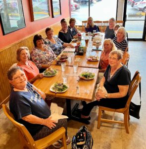 Group of club members at book club discussion