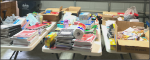 Tables filled with school donations