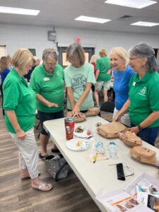 Club Members Practicing CPR