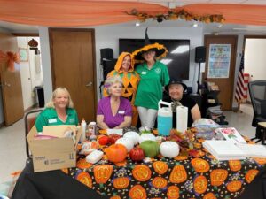 Club members in costume with  clients “Halloweening”   