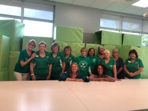 Members Wrap Large Donation Boxes for Meals on Wheels