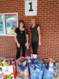 Club Delivers Gifts for Lutz Elementary Families