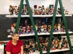 Phyllis Hoedt and Some of the Nutcrackers She Donated to the Old Lutz School