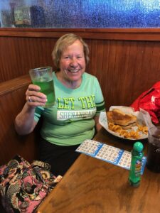 Lifting a Glass of Green Beer at the Boggy Creek Bingo on 3/17