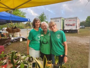 Members Helping the Plant Lady Set Up