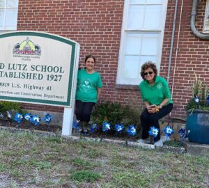 Members "Plant" Pinwheels for Child Abuse Prevention Month