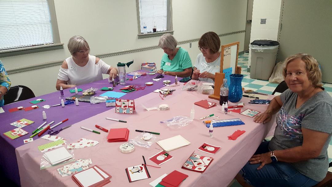 Members Assembling Cards