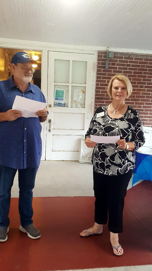 Woman's Club President Accepts Grant