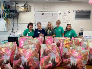 Members Deliver Thanksgiving Food Bags to Miles Elementary
