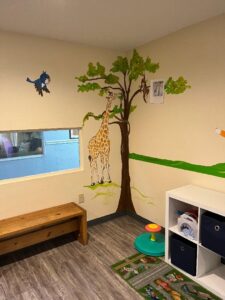 Newly decorated & painted resident children’s playroom at Sunrise Shelter.