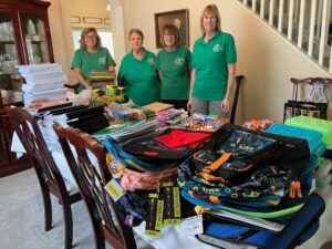 Club Members with Donated School Supplies