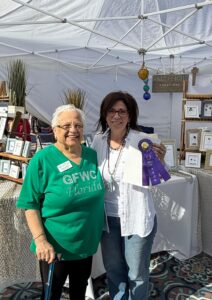 Club President, Peggy Andrews, Presents  Best in Show Award to Denise Fitzgerald