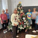 Decorating the Club Christmas Tree