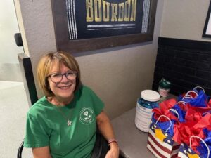 Member with the door prizes.