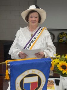 Club Member narrating the history of passage of the 19th Amendment giving women the right to vote.