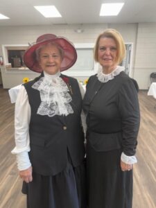 Club Members dressed as suffragettes.