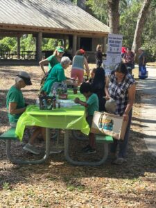 Green Shirt Ladies' Table at Crews Lake Park Earth Day Celebration