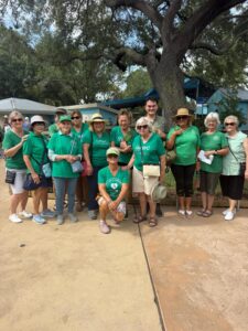 The Green Shirt Ladies Pose with Zookeeper Shane.
